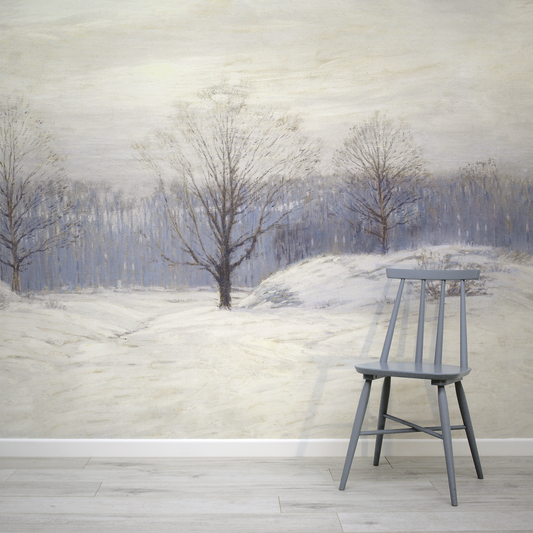 Gray stool in front of a wall with a winter landscape mural