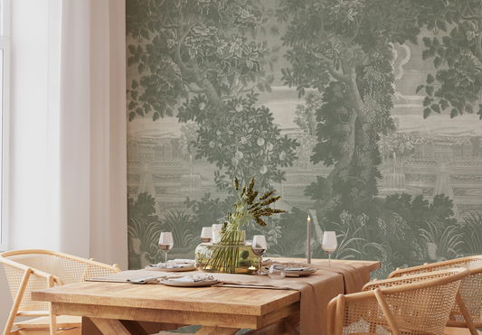 Dining room with wooden table and chairs against a wall with nature-themed wallpaper