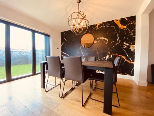 'Inisonies' black marble wallpaper mural in a bright trendy dining room.