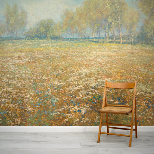 Penelope Wallpaper Wooden chair in front of a mural depicting a field with trees