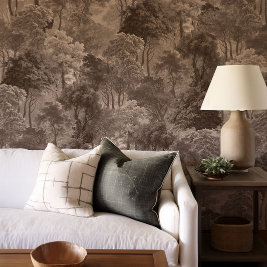 Living room with a forest wallpaper, white sofa, and wooden side table.