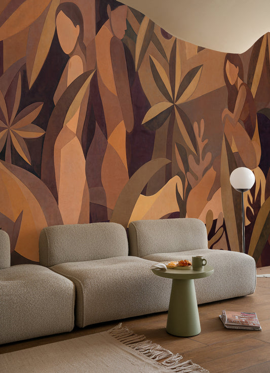 Modern living room with a patterned wall, beige sofa, and decorative table.