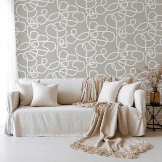 Abstract Curls Neutral Wallpaper In Living Room With Long White Transparent Curtains And Cream Chair WIth Fluffy Rug