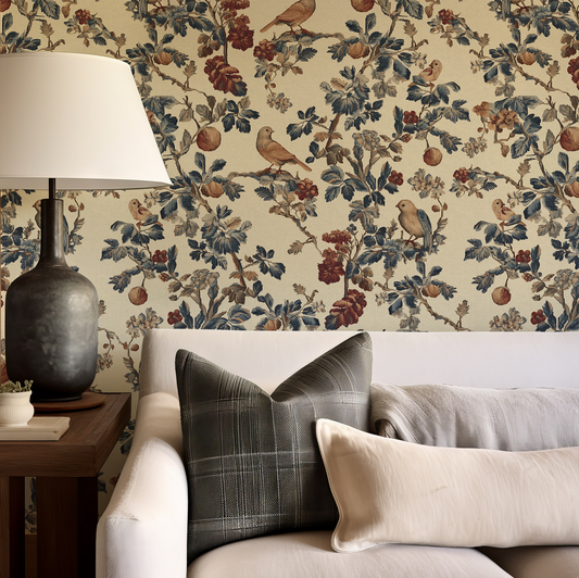 Living room with floral wallpaper, lamp, and sofa with decorative pillows.