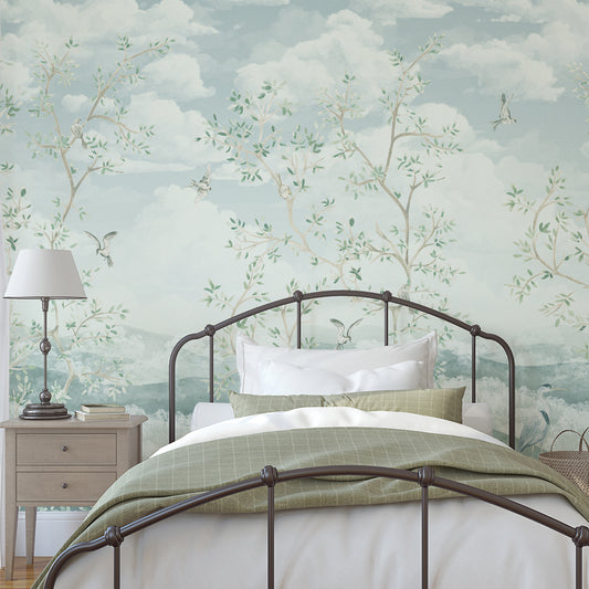 Bedroom with floral wallpaper, bed, nightstand, and lamp.