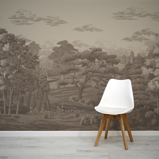 White chair with wooden legs against a wall with nature-themed wallpaper