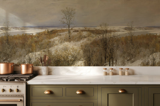 Kitchen with green cabinets, white countertop, and copper pots against a scenic wall mural.