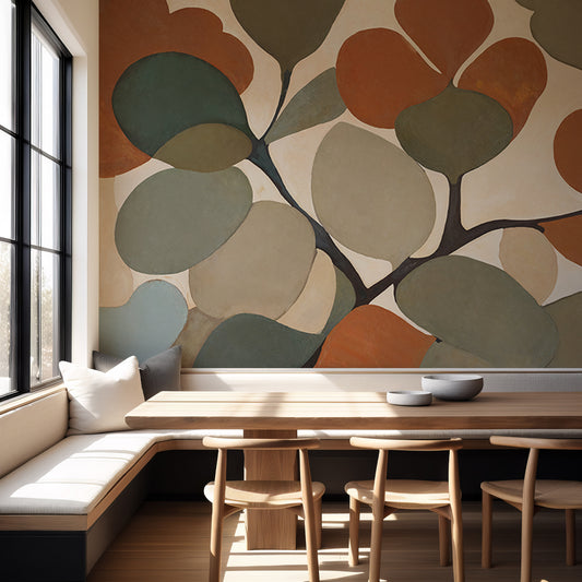Dining area with a large abstract wall mural featuring leaves.