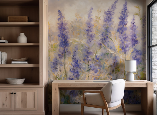 Home office with wooden desk, chair, and floral wall art.