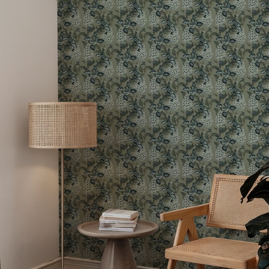 Blue Peacock wallpaper with a wicker chair 