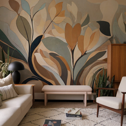 Living room with a decorative wall mural featuring abstract leaves.