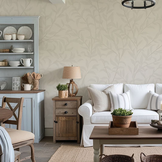 Living room with white sofa, wooden coffee table, and decorative items.