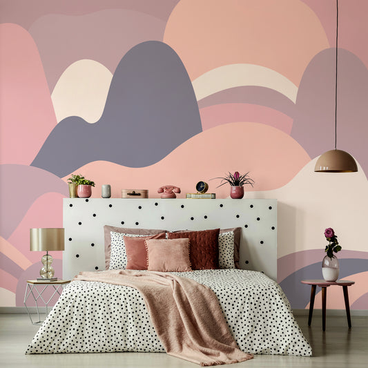 Mellow Curved Horizon wallpaper in womens bedroom with polka dot bedding and polka dot bed board with plants on top in pink plant pots
