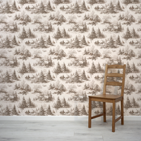 Wooden chair in front of a wallpaper with deer and tree pattern