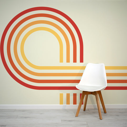 Retro Spiral Mural Reds Wallpaper in living room with small white plastic chair