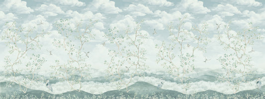 Scenic wallpaper with trees, mountains, and clouds on a light blue background