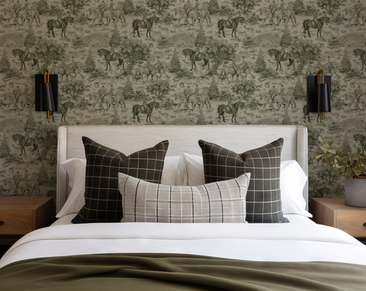Bedroom with horse-patterned wallpaper and decorative pillows on a bed.