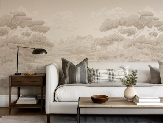 Living room with a white sofa, side table, and coffee table against a wall with cloud wallpaper.