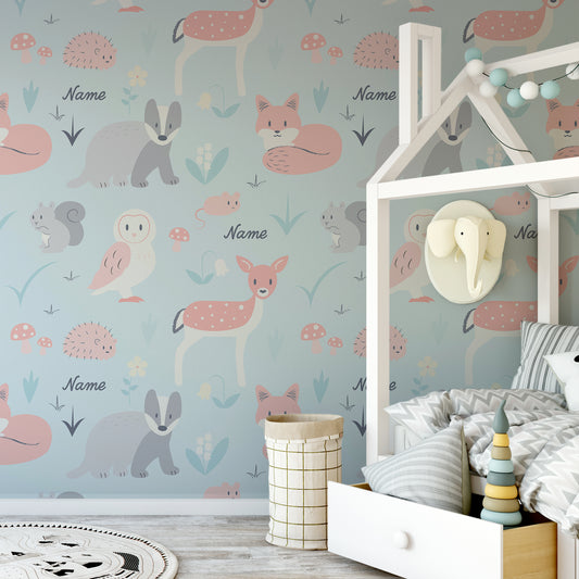 Whimsical Woodland Friends Sky wallpaper in children's bedroom with white bed and grey zig zag pattern bedding with elephant shaped hanger