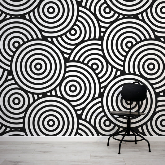 Circles - Black & White Optical Illusion Wallpaper Mural with Black Office Chair