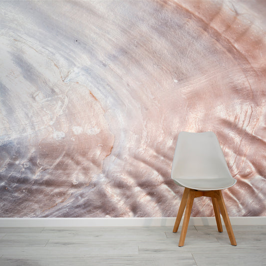 Nacre pearl effect wall mural with a grey chair in a neutral room by WallpaperMural.com