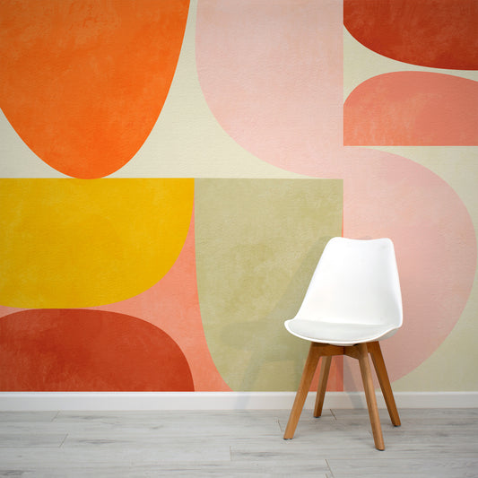 Vera is a bauhaus inspired abtract wallpaper in orange, red, pink. 